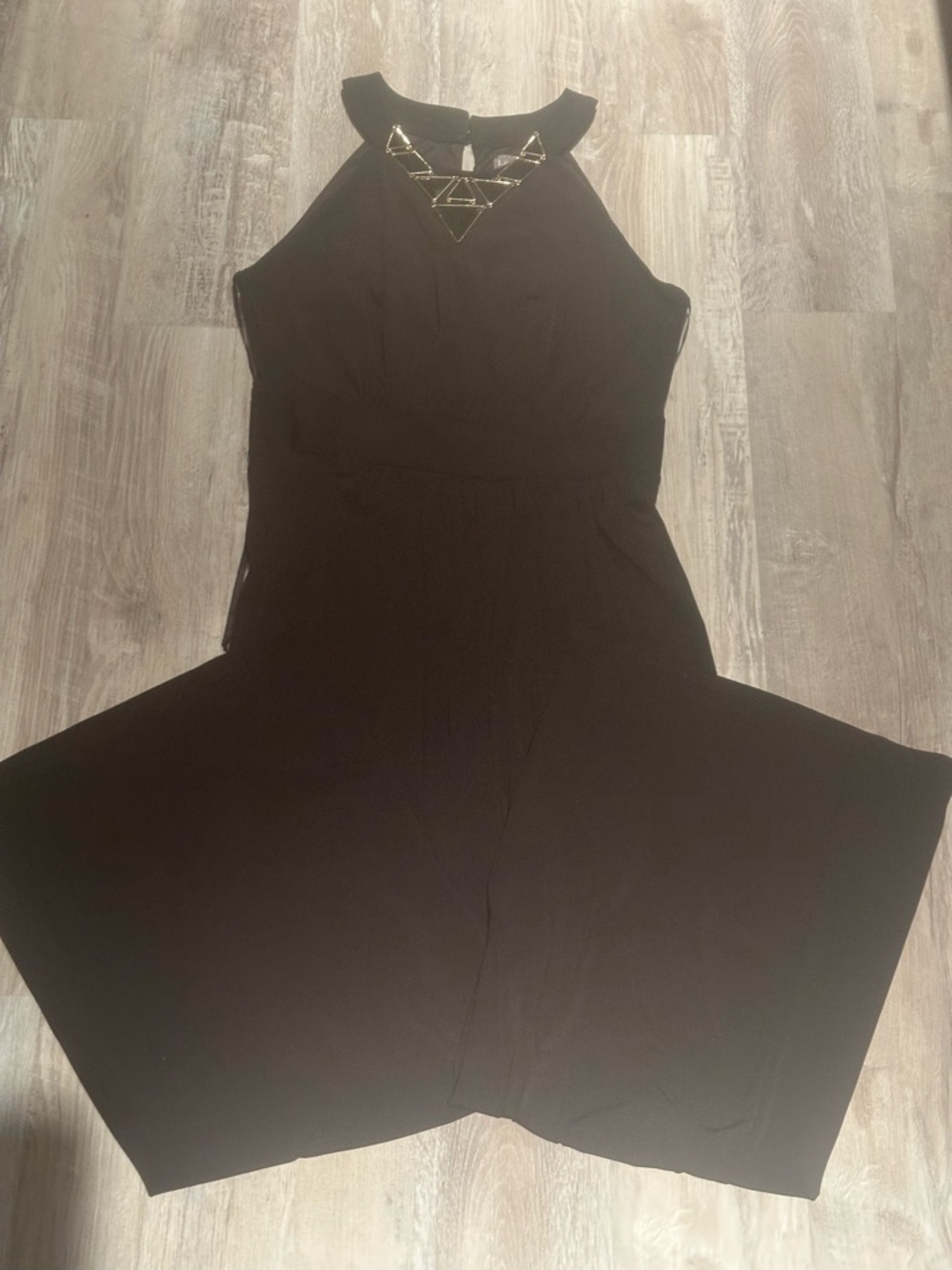 Sleeveless Black Jumpsuit with Gold Triangle Detail